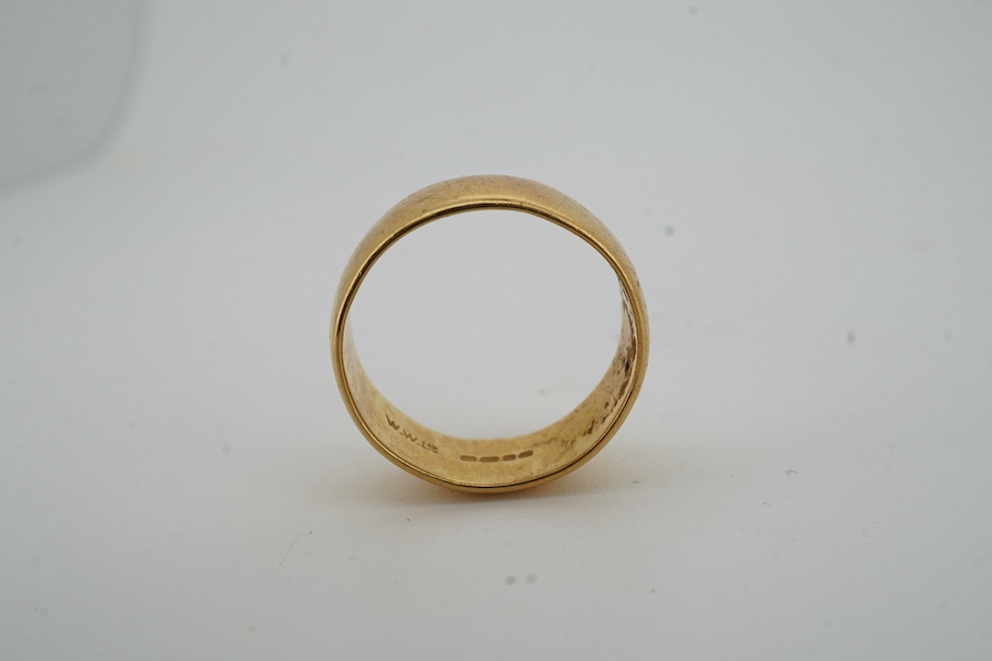 A 22ct gold wedding band, circa 1972, the 7.5mm band of plain design, size N1/2, British hallmarks, sponsor's mark WWLd, gross weight 7 grams